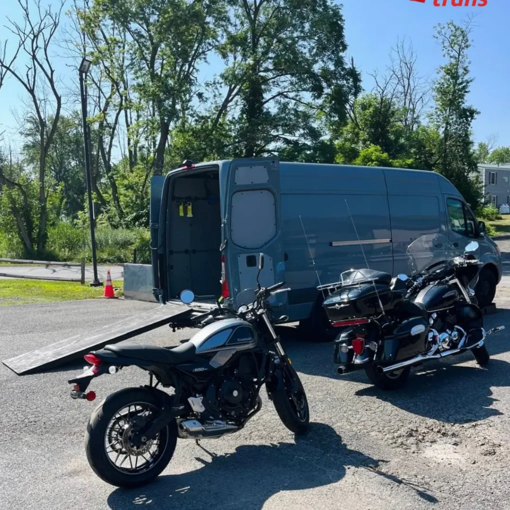 Motorcycles loaded on a trailer for transport
